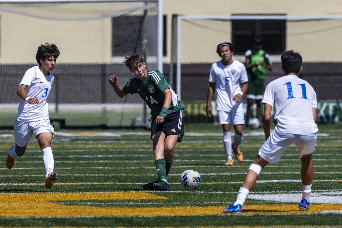 Jadon Brickman ’25 looks to find an open man. The Patriots brotherhood, family mentality and strong abilities to pass the soccer ball lead the Patriots to successful possessions.