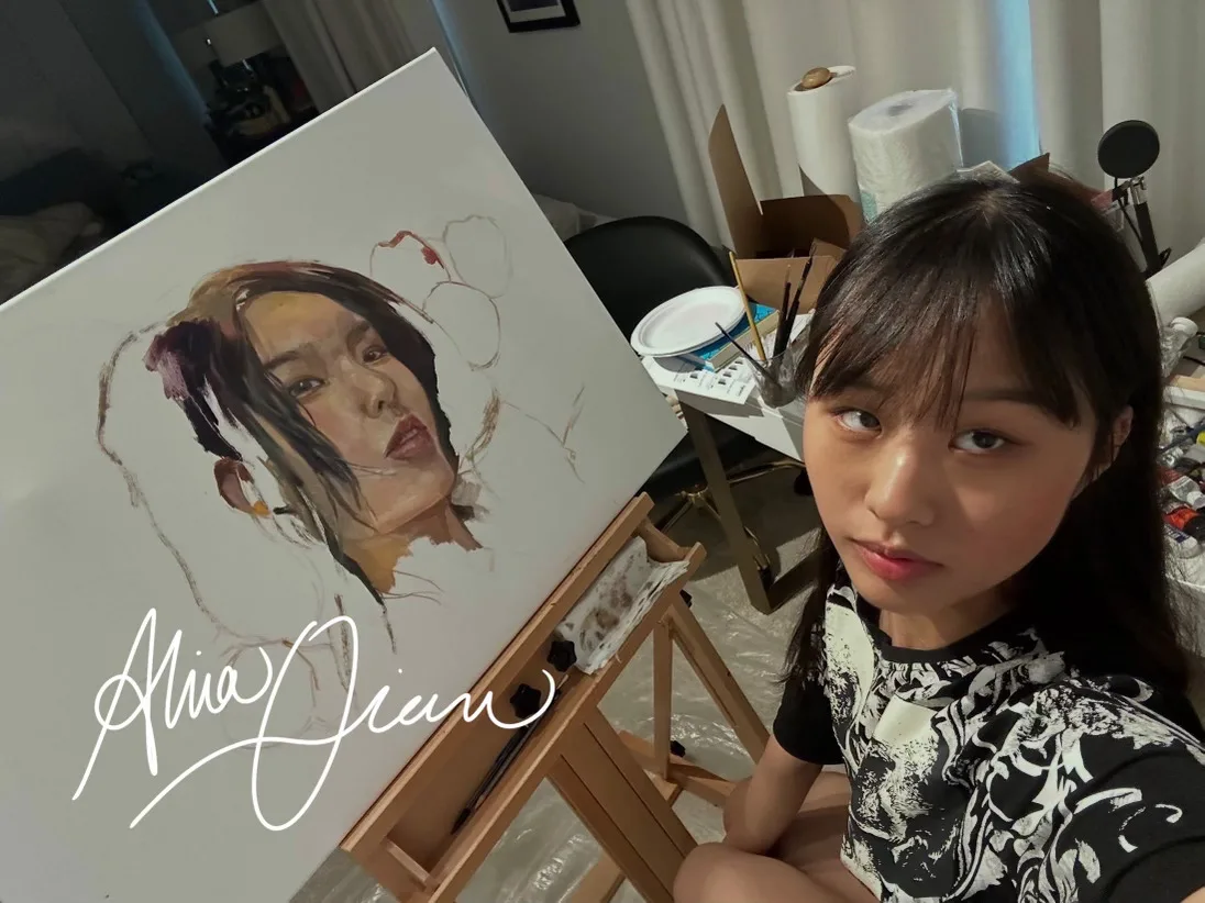 Photo illustration of Alina Qian ’25’s signature overlaid on a picture of her working in her home studio. The painting in progress is her work titled “Fresh Produce.”