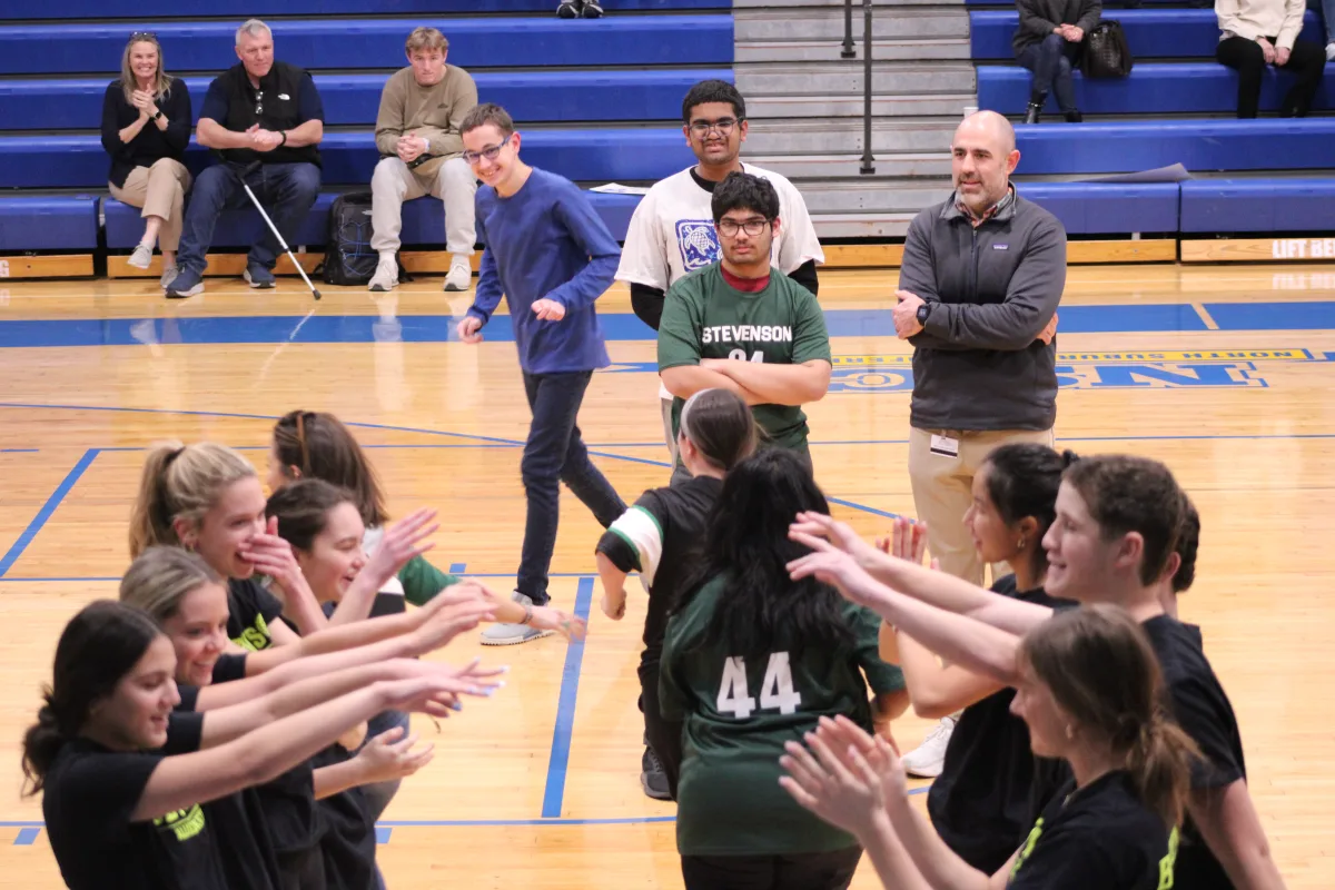 Student Partners for the Patriots Allied Basketball cheer the athletes before the game. Maintaining a positive environment during games and practices are one of the top priorities for student leaders. 